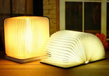 3D folding wooden book lamp by Home & Beyond Co, featuring a unique design with warm lighting and natural wood finish.